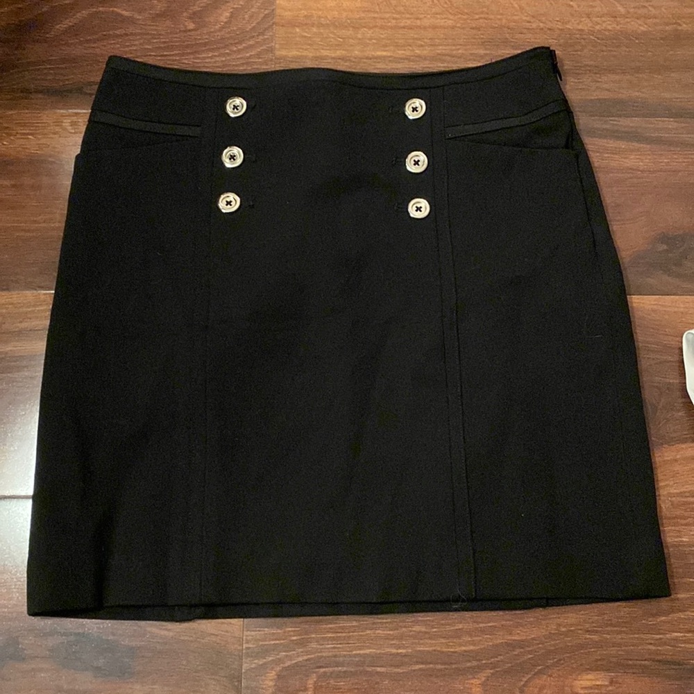 Brand new White House Black Market skirt. Zips on the side